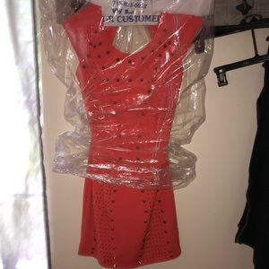 Salmon/orange colored knee length dress